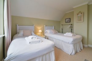 Twin bedroom on the first floor at Penpor