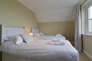 Twin bedroom on the first floor at Penpor