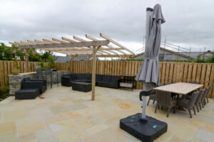 Patio area with pergola and ample seating at Ridgegrove