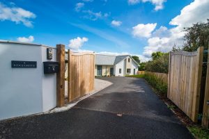 Driveway leading to Ridgegrove with large gates