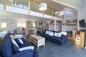 Open plan lounge and kitchen area at Ridgegrove