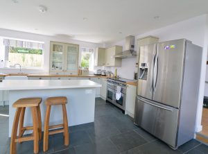 Kitchen area with large fridge freezer at Ridgegrove