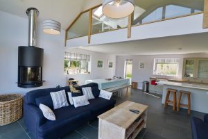 Open plan lounge, kitchen and dining area at Ridgegrove