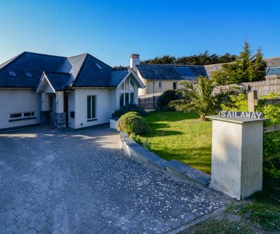 View of entrance to house and parking at Sailaway