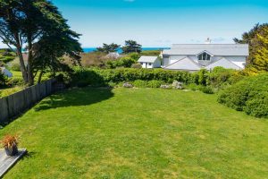 View over grassed rear garden at Sailaway from first floor balcony