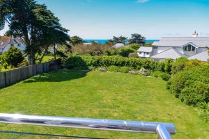 View over grassed rear garden at Sailaway from first floor balcony