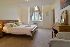 Ground floor king ensuite bedroom at Sailaway