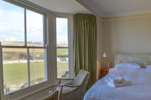 View across the grassed area above the beach from the first floor master bedroom at Santa Marina