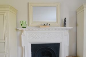 Feature fireplace in the first floor master bedroom at Santa Marina