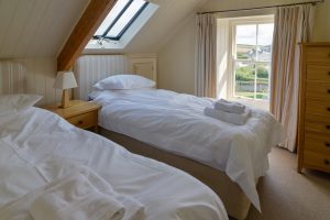 Twin bedroom on the second floor at Santa Marina