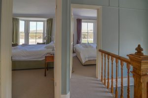 Picture from the 1st floor landing at Santa Marina into both the superking and king bedrooms at the front of the house