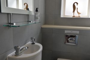 Toilet room on the first floor at Santa Marina showing wash hand basin