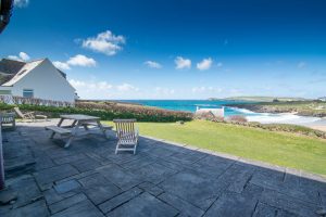 View over the beach from the patio at South Corner