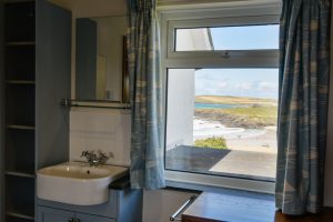 View over Treyarnon Bay towards Trevose Head from the triple room at South Corner