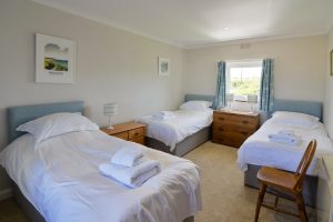 Triple bedroom at South Corner with three singe beds