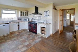 Kitchen area with range over and other kitchen facilities at South Corner