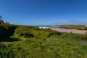 View over Treyarnon Bay beach from the garden at The Buck