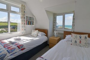 One of two twin bedrooms on the first floor at The Buck with views to the side and front of the house
