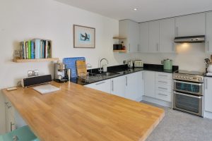 Kitchen area at The Riding with breakfast bar