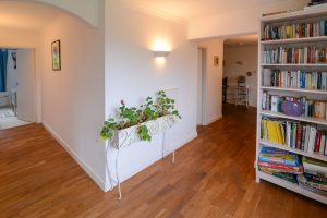 Entrance hallway at The Ridings with large bookshelf