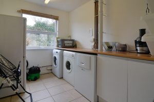 The utility room at The Ridings with appliances