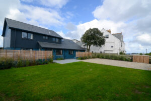 Parking area and grassed lawn at the front of Torridon