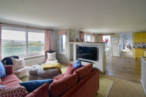 The open plan first floor lounge dining and kitchen areas at Torridon