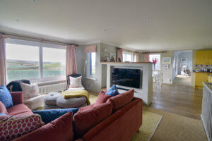 Photo from the first floor lounge area to the kitchen and dining areas as Torridon
