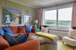 the cosy lounge area on the first floor at Torridon with comfortable seating and countryside view