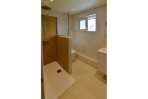 The ensuite for the first floor king bedroom at Torridon with large shower toilet and wash basin