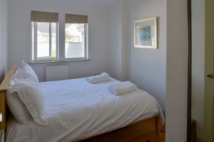 The double bedroom at Tregarne with window to the front of the property