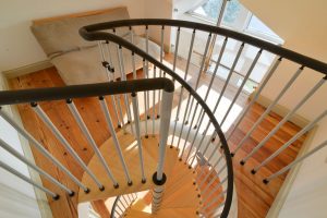 Looking down the spiral staircase from the mezzanine at Tregarne
