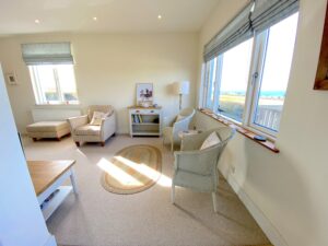 Large lounge off the kitchen and dining area at Sunset