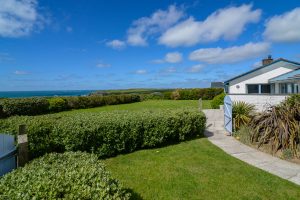 Grassed garden area at side and back of Atlantic Breezes