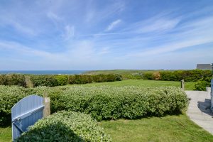 View of grassed garden area to the side and rear or Atlantic Breezes