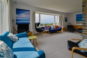 Lounge at Atlantic Breezes with sea views and ample seating