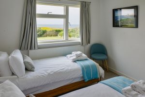 Ground floor single twin beds with sea views at Atlantic Breezes