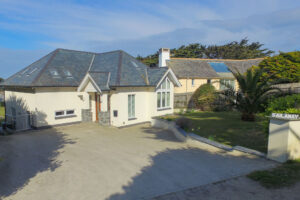 View of the parking area and front of house at Sailaway