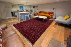 Open plan lounge and kitchen area at The Studio at Pensile House