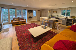 Open plan lounge and kitchen area at The Studio at Pensile House