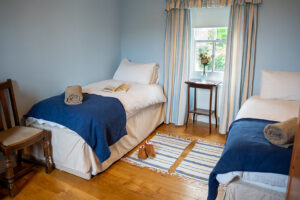 Twin single beds in bedroom 3 at Carrek Cottage