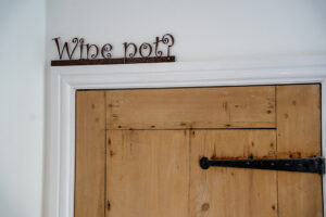 Sign above door at Carrek Cottage