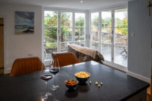 Kitchen views out of back patio doors at Carrek Cottage