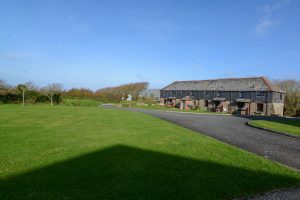 Front of Stable Cottage and adjoining properties from the front grassed area