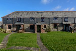 Front of Stable Cottage and adjoining properties from the front grassed area