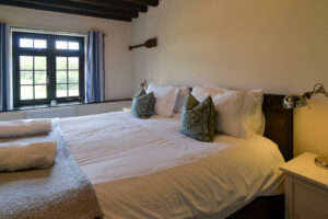 Superking bedroom on ground floor at Stable Cottage