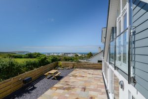 View over the rear garden toward Trevose Head and the ocean
