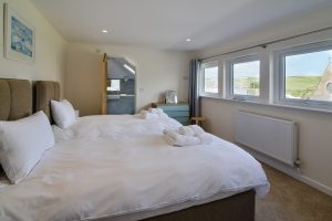 The first floor ensuite twin bedroom at Trebriani with beds that can be made as a superking if requested