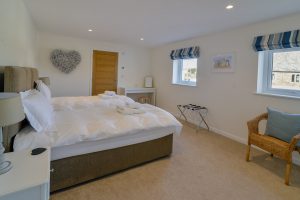 The ground floor ensuite twin bedroom at Trebriani with beds that can be made as a superking if requested
