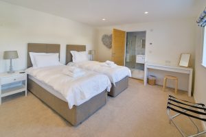 The ground floor ensuite twin bedroom at Trebriani which can be made as a superking if requested